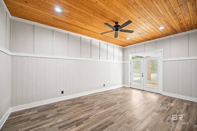 15031 Timber Ridge Dr, Loxley, AL 36551 - spare room with baseboards, french doors, ceiling fan, wood ceiling, and wood finished floors