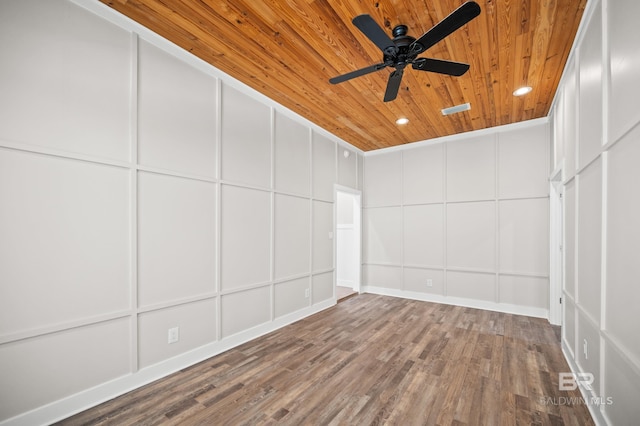 15031 Timber Ridge Dr, Loxley, AL 36551 - spare room featuring a decorative wall, recessed lighting, wooden ceiling, and wood finished floors