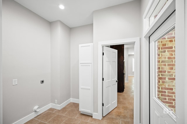 15031 Timber Ridge Dr, Loxley, AL 36551 - laundry area with baseboards, hookup for an electric dryer, and laundry area