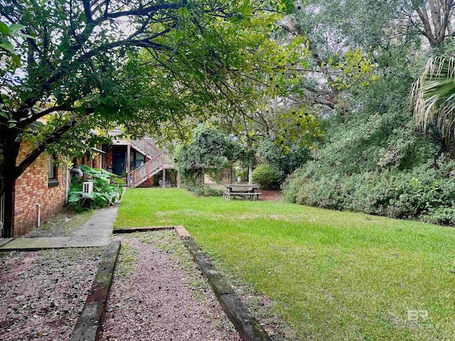 531 W Laurel Ave, Foley, AL 36535 - view of grassy yard with stairway