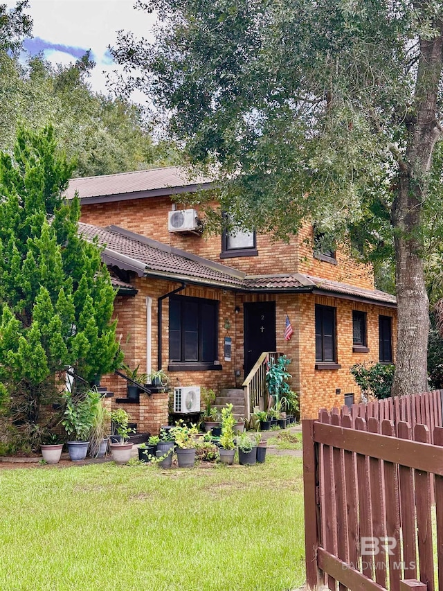 531 W Laurel Ave, Foley, AL 36535 - view of front of house featuring brick siding and a cooling unit