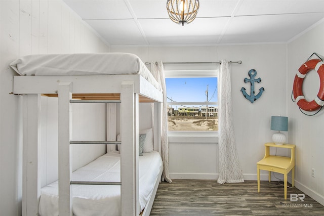 2816 Ponce De Leon Ct, Gulf Shores, AL 36542 - bedroom with baseboards, ornamental molding, and wood finished floors