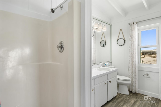 2816 Ponce De Leon Ct, Gulf Shores, AL 36542 - bathroom with toilet, wood finished floors, vanity, and walk in shower