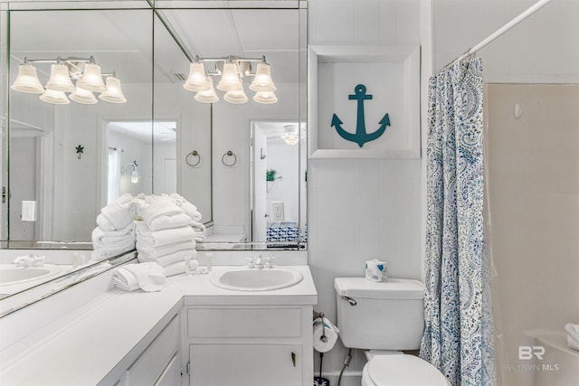 2816 Ponce De Leon Ct, Gulf Shores, AL 36542 - full bathroom featuring toilet, curtained shower, and vanity
