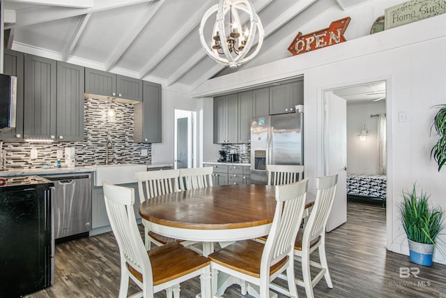 2816 Ponce De Leon Ct, Gulf Shores, AL 36542 - dining area featuring a notable chandelier, dark wood-style flooring, and vaulted ceiling with beams