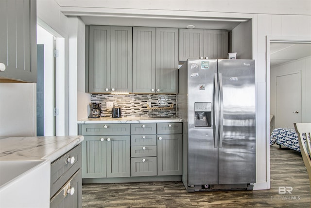 2816 Ponce De Leon Ct, Gulf Shores, AL 36542 - kitchen with gray cabinetry, stainless steel refrigerator with ice dispenser, and dark wood finished floors