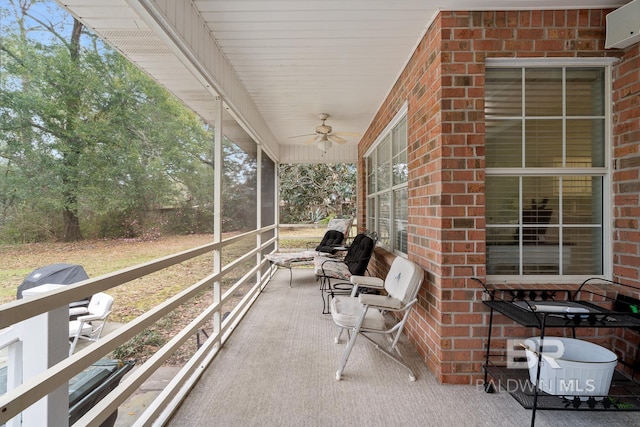 view of patio featuring a ceiling fan