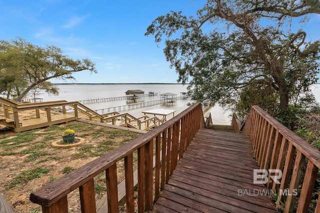 deck featuring a water view