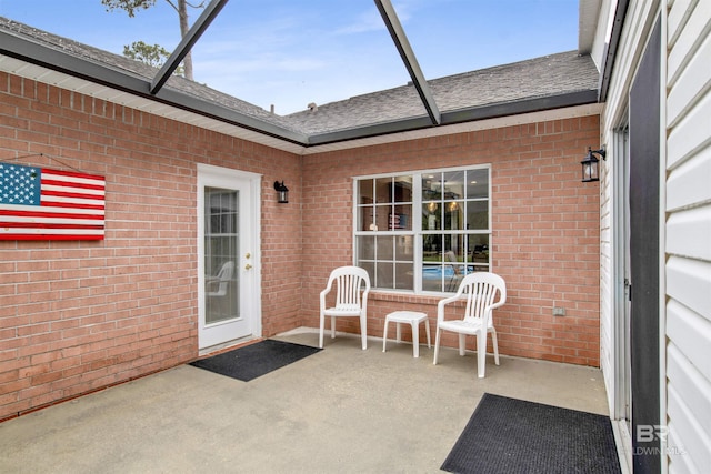 view of patio / terrace with a lanai