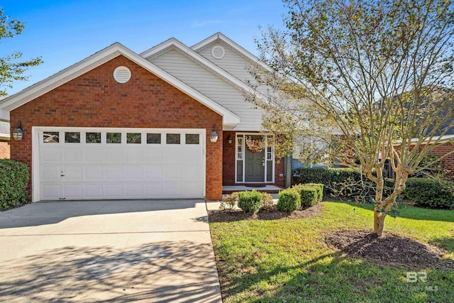 view of front facade with brick siding, driveway, a front lawn, and a garage
