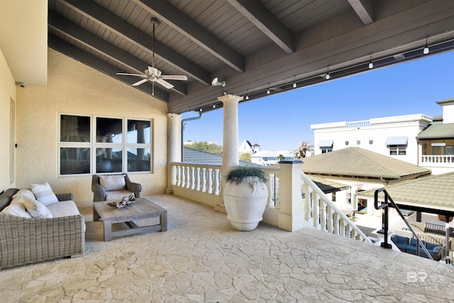 view of patio featuring a ceiling fan