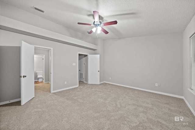 20 Summer Oaks Dr, Daphne, AL 36526 - unfurnished bedroom featuring carpet floors, a textured ceiling, ensuite bath, and a ceiling fan
