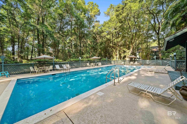20 Summer Oaks Dr, Daphne, AL 36526 - community pool with a patio and view of wooded area