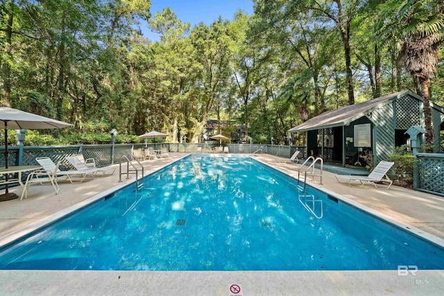 20 Summer Oaks Dr, Daphne, AL 36526 - community pool with a patio and view of wooded area