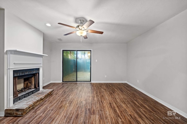 20 Summer Oaks Dr, Daphne, AL 36526 - unfurnished living room featuring a fireplace with raised hearth, ceiling fan, wood finished floors, and recessed lighting