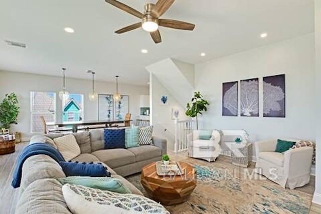 1492 Shell Ln, Gulf Shores, AL 36542 - living room with wood finished floors, a ceiling fan, and recessed lighting