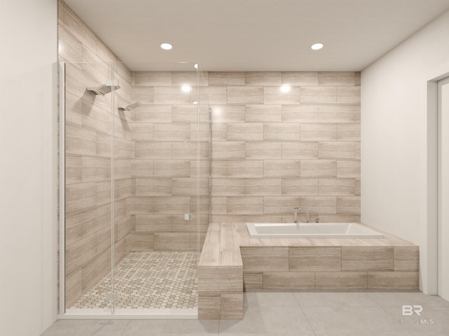 bathroom featuring recessed lighting, a garden tub, a shower stall, and tile patterned floors