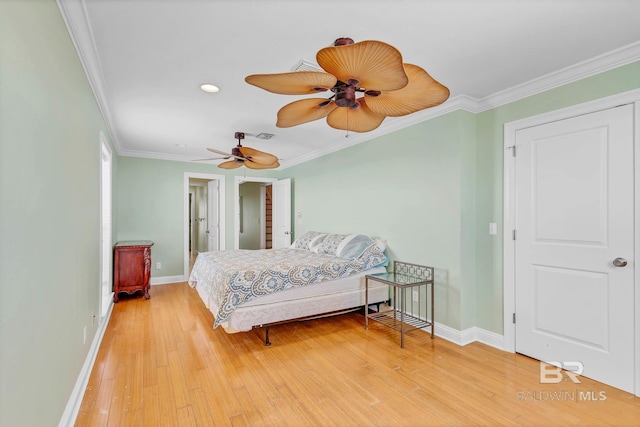 1328 W Lagoon Ave, Gulf Shores, AL 36542 - bedroom with crown molding, light wood-type flooring, recessed lighting, and a ceiling fan