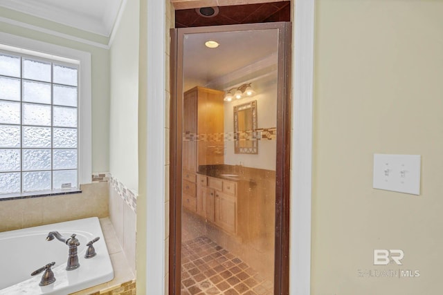 1328 W Lagoon Ave, Gulf Shores, AL 36542 - bathroom with ornamental molding, vanity, and a bath