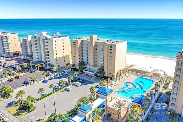 bird's eye view with a view of the beach and a water view