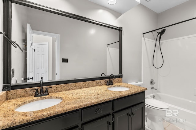 full bathroom with vanity, bathing tub / shower combination, and toilet