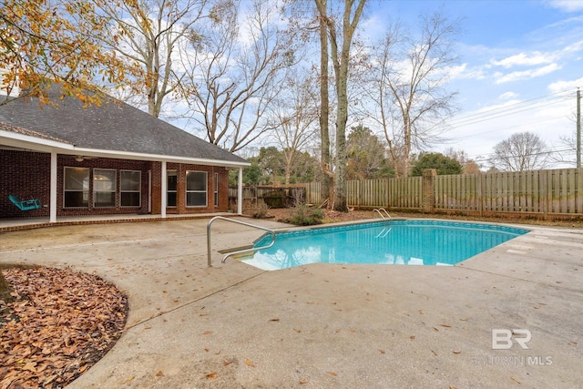 view of pool featuring a patio