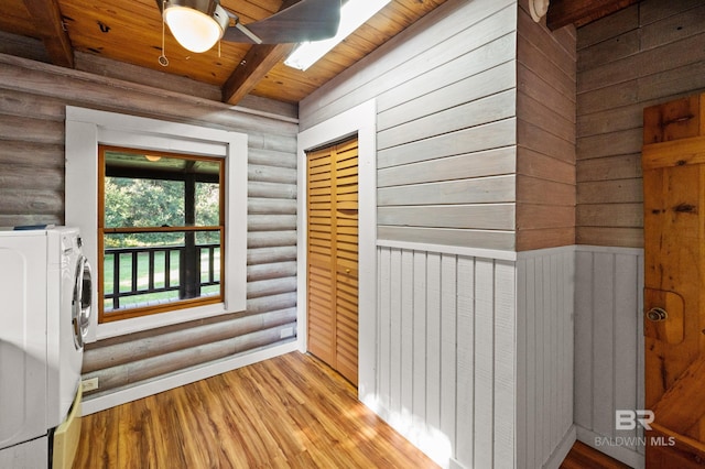 interior space with ceiling fan and washer / clothes dryer