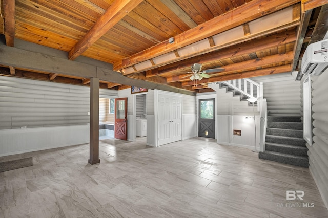interior space featuring washer / dryer, wooden ceiling, a wall mounted AC, and ceiling fan