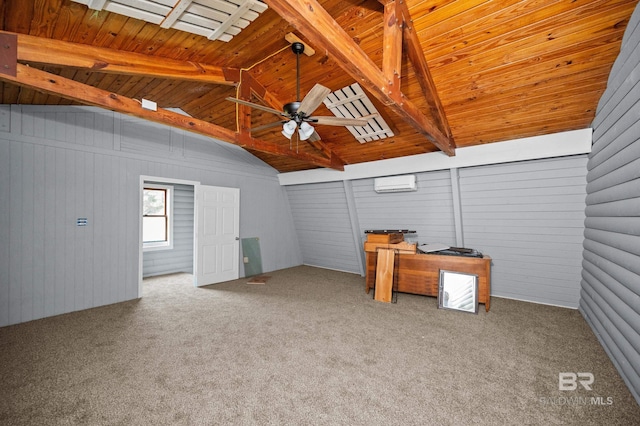 empty room with vaulted ceiling with beams, wood ceiling, a wall mounted air conditioner, carpet flooring, and ceiling fan