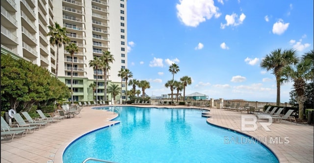 375 Beach Club Trl Unit A1704, Gulf Shores, AL 36542 - community pool featuring a patio