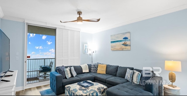 375 Beach Club Trl Unit A1704, Gulf Shores, AL 36542 - living area featuring wood finished floors, crown molding, and a ceiling fan