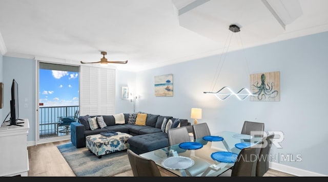 375 Beach Club Trl Unit A1704, Gulf Shores, AL 36542 - dining room featuring wood finished floors, ceiling fan, ornamental molding, and baseboards