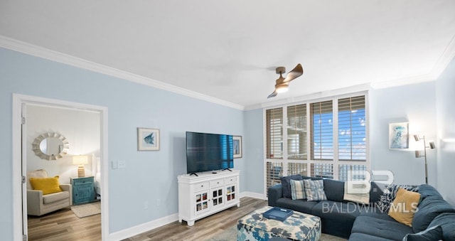 375 Beach Club Trl Unit A1704, Gulf Shores, AL 36542 - living area featuring ornamental molding, wood finished floors, baseboards, and a ceiling fan
