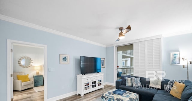 375 Beach Club Trl Unit A1704, Gulf Shores, AL 36542 - living area featuring wood finished floors, ornamental molding, and baseboards