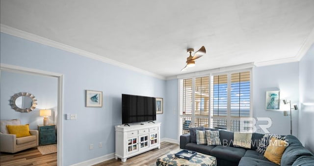 375 Beach Club Trl Unit A1704, Gulf Shores, AL 36542 - living room with wood finished floors, ornamental molding, and baseboards