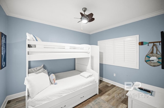 375 Beach Club Trl Unit A1704, Gulf Shores, AL 36542 - bedroom with ornamental molding, wood finished floors, baseboards, and ceiling fan