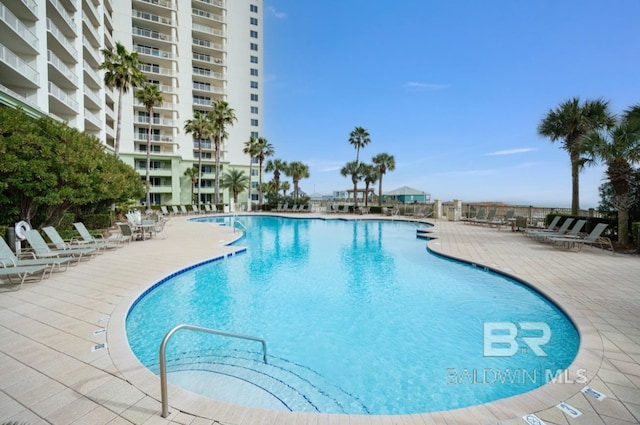 375 Beach Club Trl Unit A1704, Gulf Shores, AL 36542 - community pool with a patio area