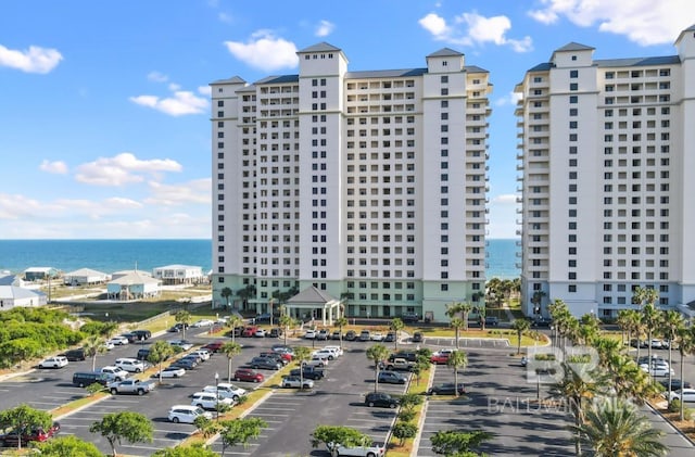 375 Beach Club Trl Unit A1704, Gulf Shores, AL 36542 - view of property featuring uncovered parking and a water view