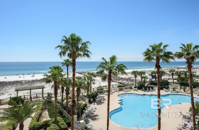 375 Beach Club Trl Unit A1704, Gulf Shores, AL 36542 - community pool featuring view of water and beach and a patio area