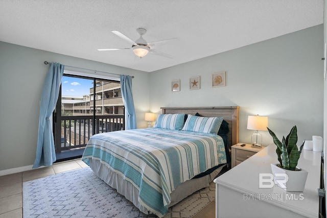 bedroom with baseboards, access to outside, tile patterned flooring, and a ceiling fan