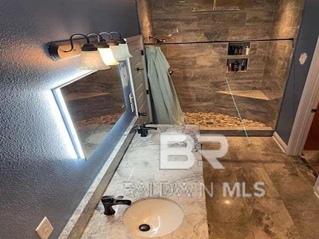 21800 Old Brady Rd, Robertsdale, AL 36567 - full bath with a tile shower