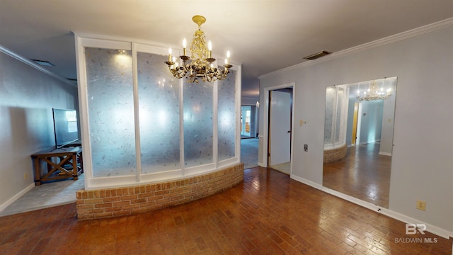 interior space featuring an inviting chandelier and crown molding