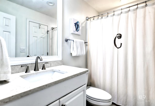 27405 Polaris St Unit 302, Orange Beach, AL 36561 - full bathroom with toilet and vanity