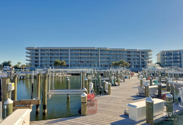 27405 Polaris St Unit 302, Orange Beach, AL 36561 - dock area featuring a water view and boat lift