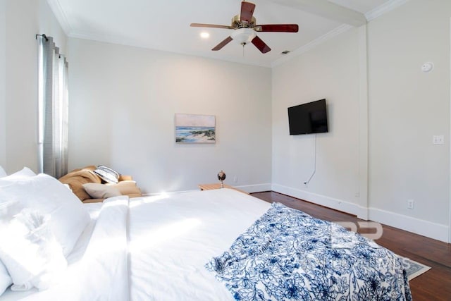 bedroom with ceiling fan, crown molding, and dark hardwood / wood-style flooring