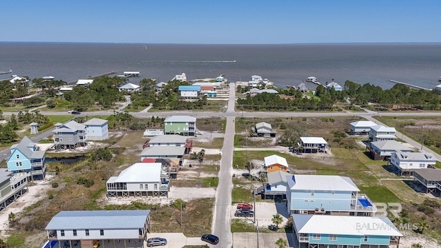 aerial view with a residential view and a water view