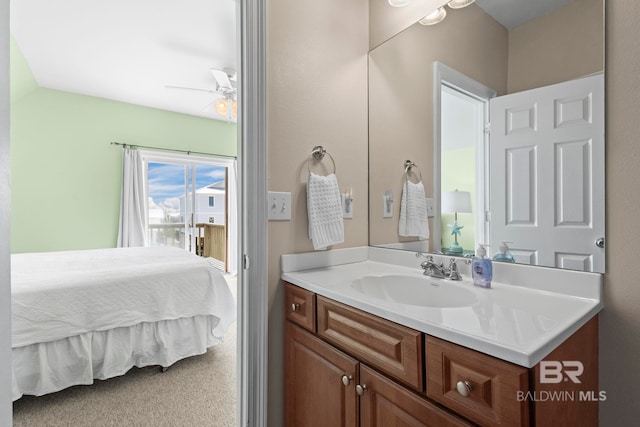 bathroom with vanity and a ceiling fan