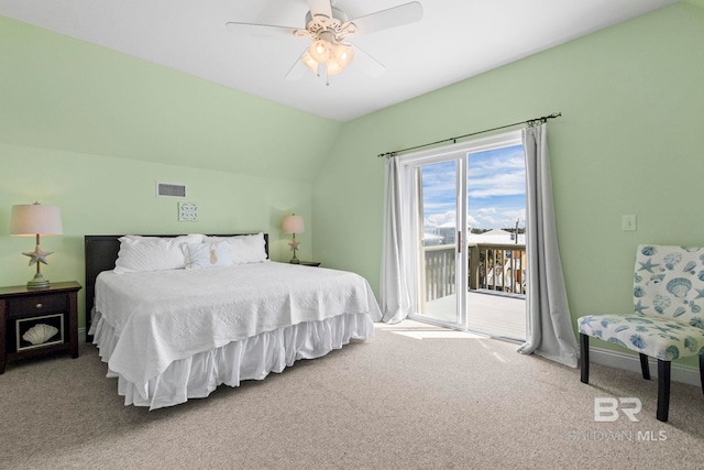 carpeted bedroom featuring baseboards, a ceiling fan, visible vents, access to exterior, and lofted ceiling