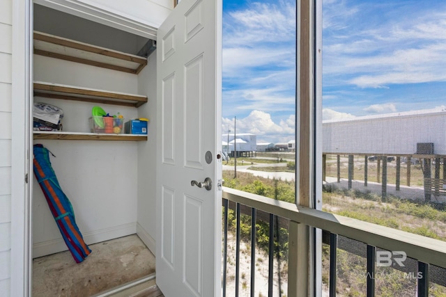 laundry area with plenty of natural light