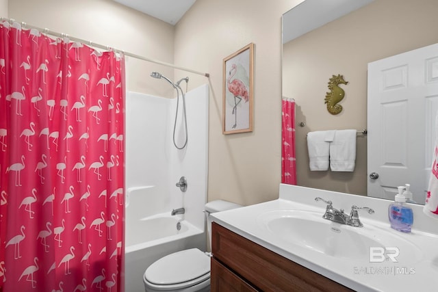 bathroom with toilet, shower / bath combo, and vanity